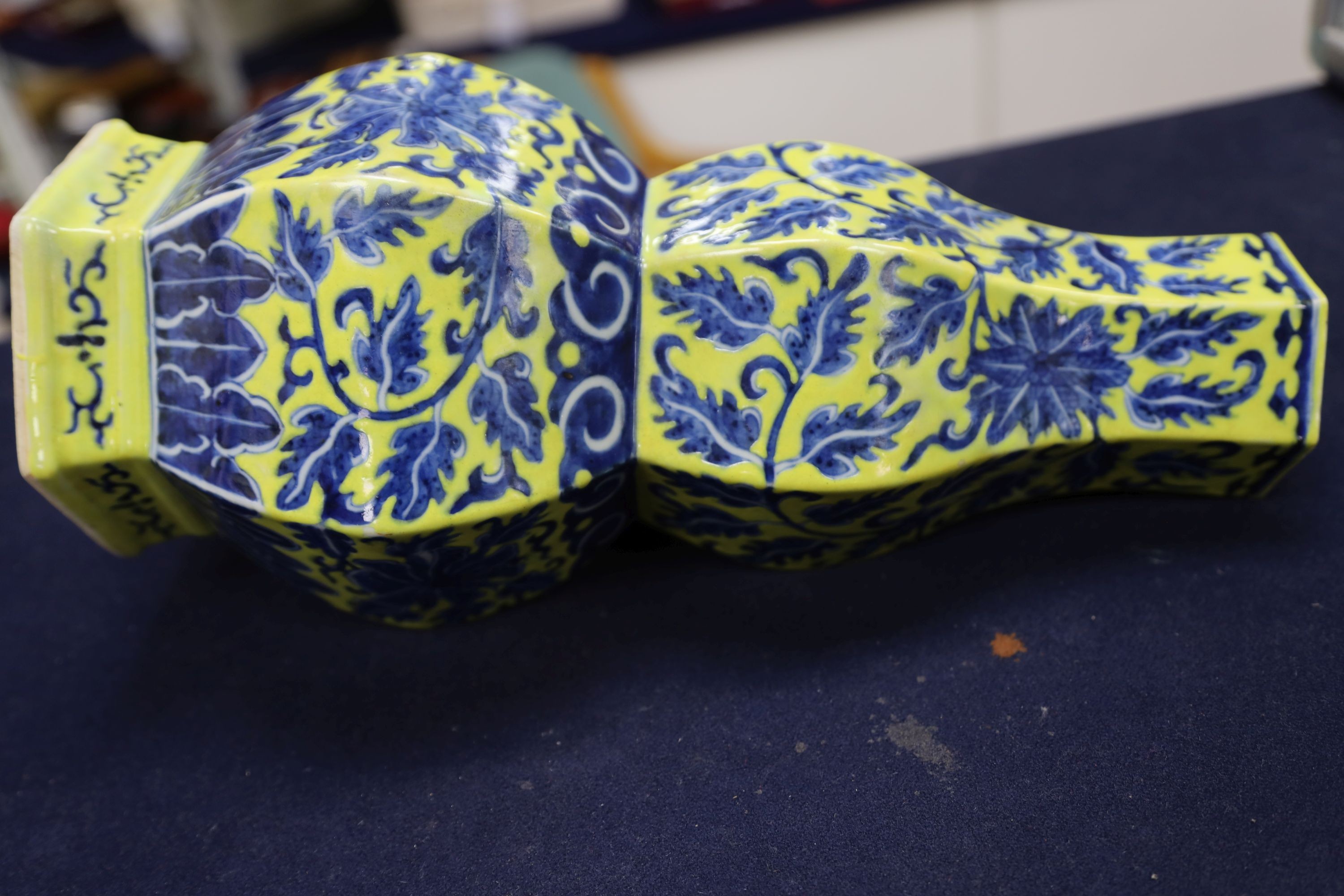 A Chinese underglaze blue yellow ground hexagonal vase, early 20th century, some restoration